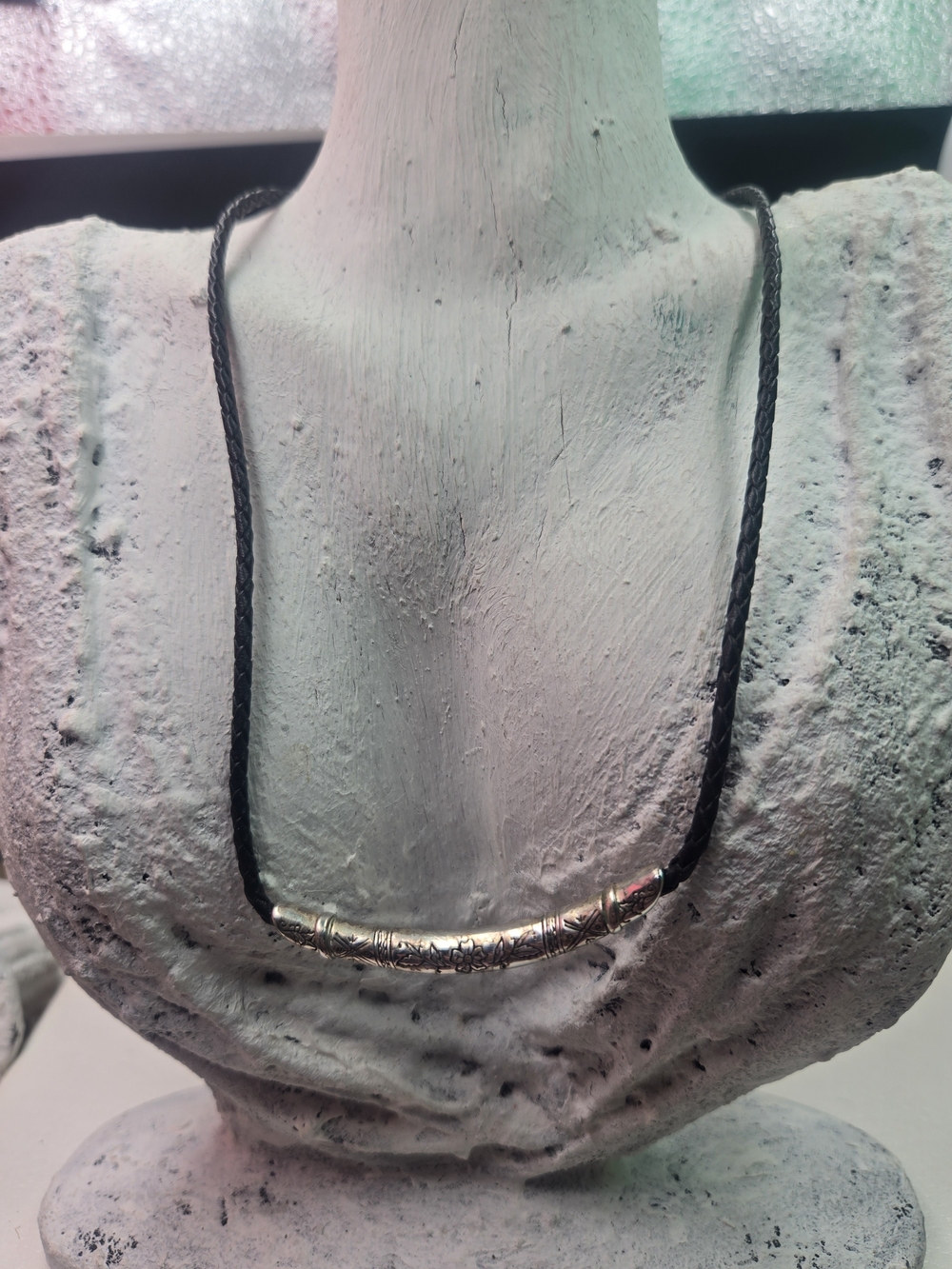 Brighton City collar necklace featuring a black braided leather cord and a silve